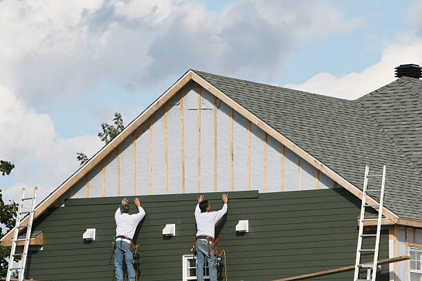 Professional Siding technician working in Burnsville, NC